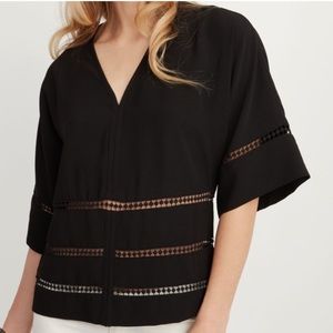 Stella & Dot black blouse w/ crochet insert cutouts